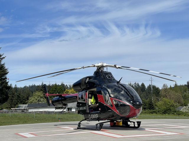 McDonnell Douglas MD-90 (C-GWXP) - MD900 helicopter designed in the early 1990s by McDonnell Douglas Helicopter Systems. Photo taken 2021-05-10 by the helipad at Lady Minto hospital in Ganges, BC.