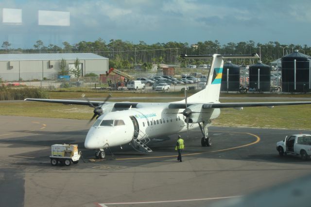 de Havilland Dash 8-300 (C6-BFJ) - 121013 prepping for flight to KMIA