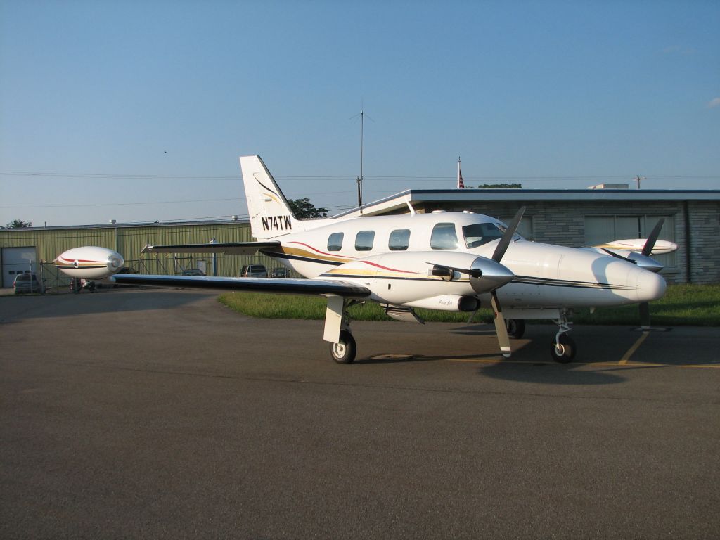 Piper Navajo (N74TW) - Parked outside the WRAP clubhouse.