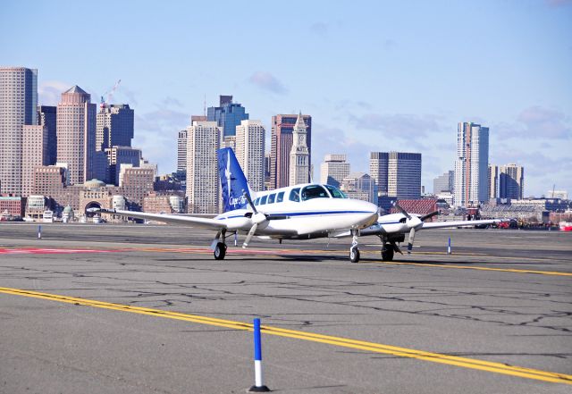 Cessna 402 — - RWY32 landing - Boston Skyline scenery 