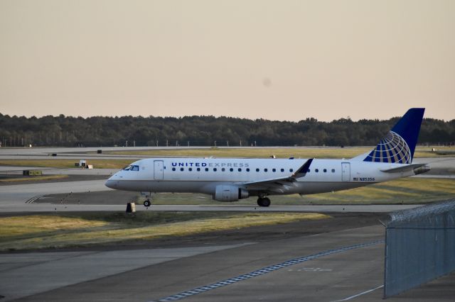 Embraer 175 (N85356) - N85356 leaves Memphis Int'l during the golden hour. 