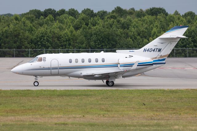 Hawker 800 (N404TM) - KORF (Norfolk International Airport) - 04 JUL 2017br /br /"Trailblazer 404" taxiing to RWY 23 for departure to Westchester County Airport (KHPN) - White Plains, NY.br /br /The pilot was pretty upset that he was directed to go to RWY 5 for departure, but could not depart due to a airport operations runway change from RWY 5 to RWY 23.