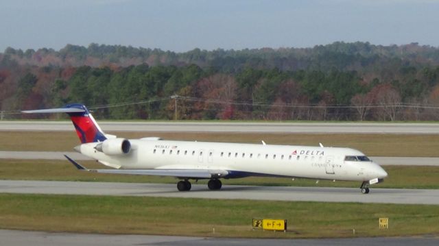 Canadair Regional Jet CRJ-900 (N936XJ) - Delta (Endeavor Air) departing to Ft. Lauderdaule at 10:16 P.M.  Taken November 27, 2015.  