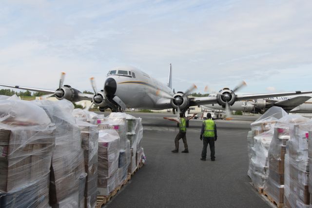 Douglas DC-6 (N100CE) - One of Everts Air Cargos workhorse DC-6 aircraft taxis back in from a flight ready for the next cargo load.