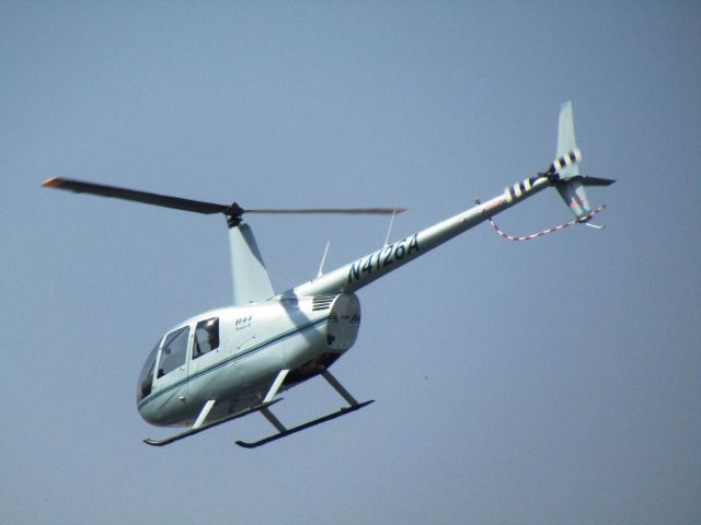 Robinson R-44 (N4126A) - Lifting off 