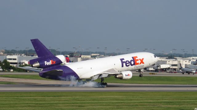 McDonnell Douglas DC-10 (N550FE) - Taken from airport overlook August 5, 2014. Arriving on 18c