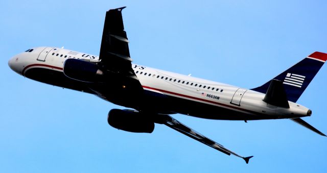 Airbus A320 (N663AW) - Departing off 30L, Yet to be repainted American Airlines jet. 12-28-2015