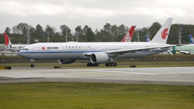 BOEING 777-300 (B-2086) - BOE153 a B777-300ER waits on the taxiway for permission to proceed onto runway 16R for another pre-delivery flight. Photographed 10/11/11.