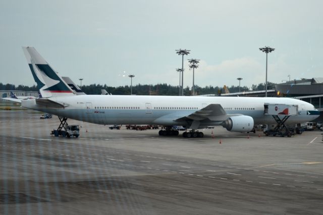 BOEING 777-300 (B-HNJ) - Being prepared for return flight to Hong Kong at terminal 1, in the early evening. Tues. 16th July 2013.