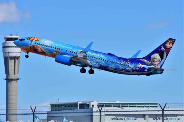 Boeing 737-800 (C-GWSV) - WestJet (Disney's Frozen Livery) Boeing 737-8CT departing YYC on Apr 28. 