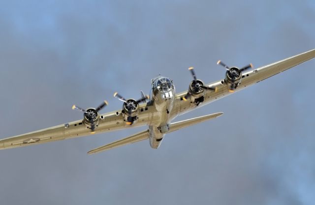 Boeing B-17 Flying Fortress (N900RW) - Exit from the photo pass during the 2008 Wings over Houston Airshow. Pyro smoke in the background. Thanks goes to Chris Ebdon (FlightAware member Ebdon) for the hookup.