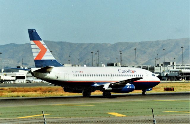 Boeing 737-200 (C-GCPU) - KSFO - date apprx 1988-90 guessing, I didn't know I had a photo of this jet until today going through old negatives I found I had never posted this anywhere - back when life was a bit better and able to go to SFO quite a bit to get more Intl carriers. The 737s from Canadien were my favorites to get...this one probably headed to Vancouver BC from Runway 1R.