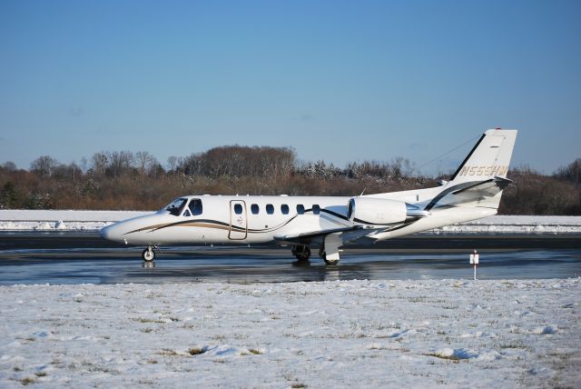 Cessna Citation II (N555HM) - Taxiing to runway 02 at Concord Regional Aiport - 3/2/09