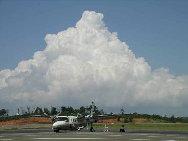 Gulfstream Aerospace Jetprop Commander (N808NC) - In Batam, Indonesia - July 06, with typical afternoon build-up.