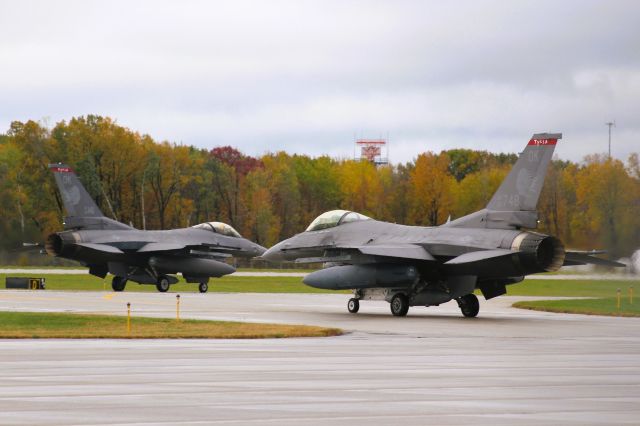 Lockheed F-16 Fighting Falcon (AFR90748) - Procession to active Runway 18 on the way to National Anthem Fly-Over for Packer Game.