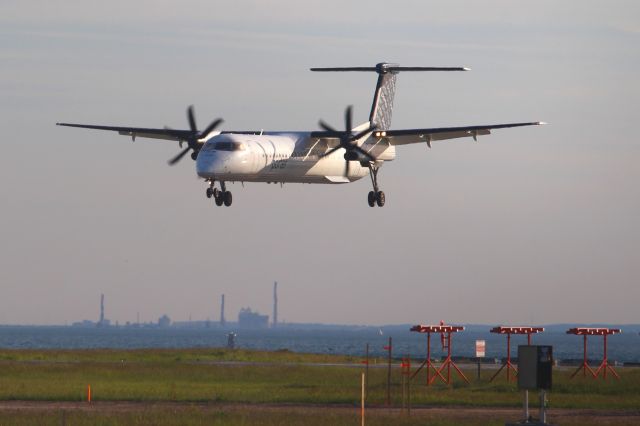 de Havilland Dash 8-400 (C-GLQL) - Taken from the parking lot just below the Control Tower at Billy Bishop