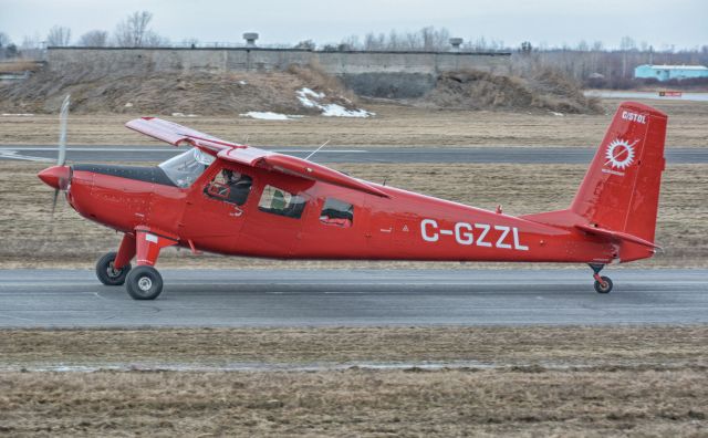 HELIO U-10 Super Courier (C-GZZL) - Taxying on Tango for a 06R departure