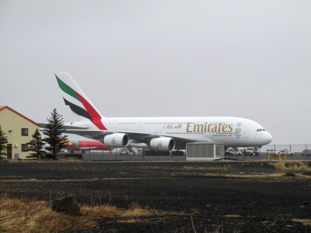 A6-EOF — - 18 Apr 2015, a rare bird appears at Keflavik, Iceland. Emirates A6-EOF. Parked in the emergency space on the tarmac for either repairs or a sick passenger.