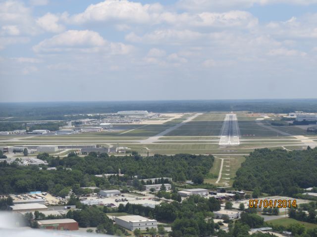 Cessna 350 (N648XL) - Landing 5R at KGSO.