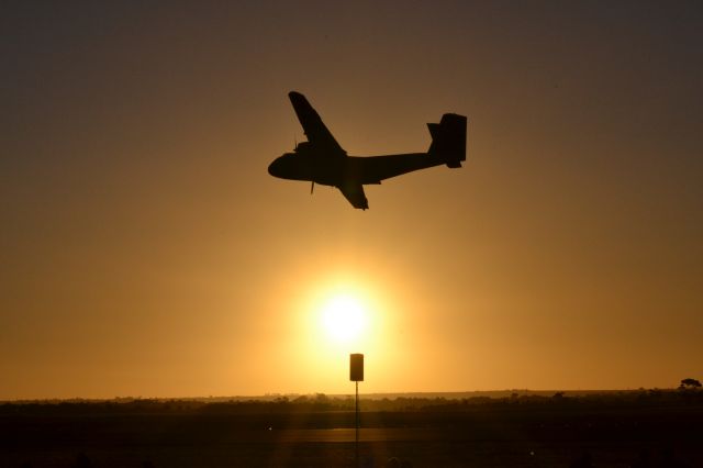 De Havilland Canada DHC-4 Caribou — - HARS Caribou overflying the Australian International Airshow 2013 as the sun sets.