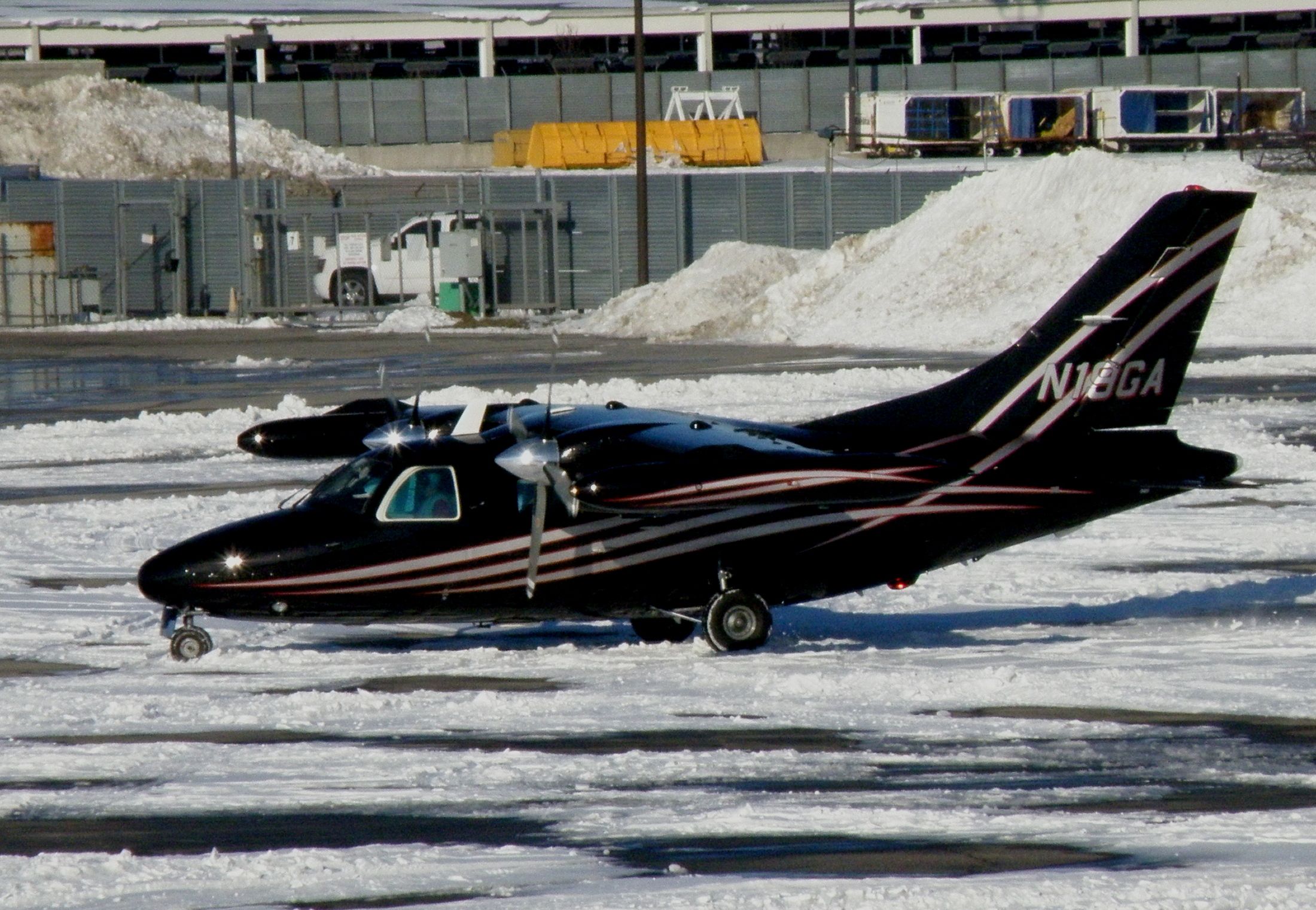 Mitsubishi MU-2 (N19GA) - A really sharp Mitsubishi Solitaire ready to depart Blue Grass Airport (KLEX) on a fueling stop between New Bedford Regional (KEWB) and Tulsa International (KTUL).... This is the ramp near TACAir (KLEX FBO)following our Winter Weather Event...