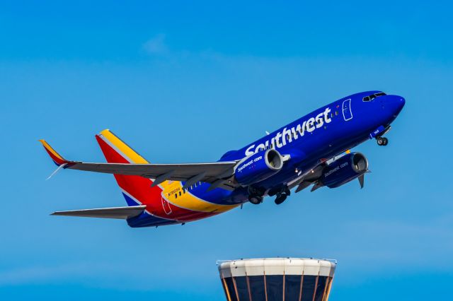 Boeing 737-700 (N7855A) - A Southwest Airlines 737-700 taking off from PHX on 3/4/23. Taken with a Canon R7 and Canon EF 100-400 L II lens.