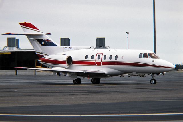 Hawker 1000 (VH-SGY) - AUSTRALIA - QUEENSLAND GOVERNMENT - RAYTHEON HAWKER 850XP - REG : VH-SGY (CN 258780) - ADELAIDE INTERNATIONAL AIRPORT SA. AUSTRALIA - YPAD 26/4/1985 35MM SLIDE CONVERSION USING A LIGHTBOX AND A NIKON P80 DIGITAL CAMERA IN THE MACRO MODE