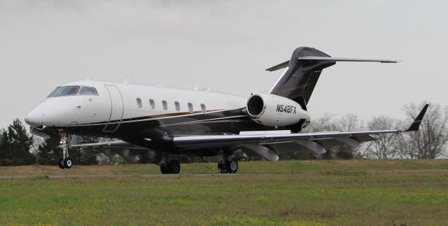 Bombardier Challenger 300 (N548FX) - A FlexJet Bombardier BD-1-1A10 Challenger 300 arriving Runway 1 at H.L. Sonny Callahan Airport, Fairhope, AL - March 1, 2019.