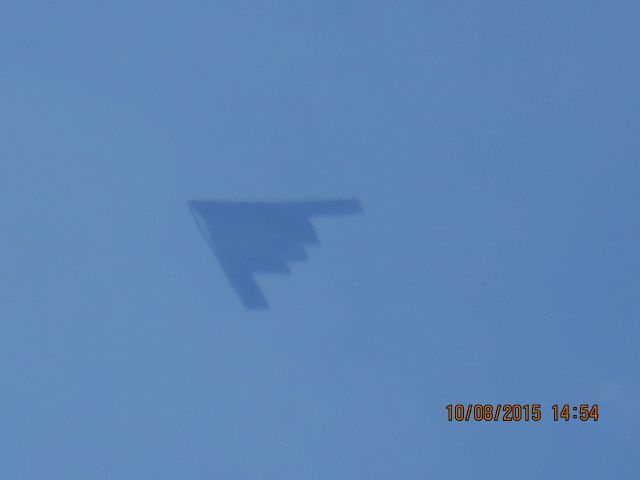 Northrop Spirit (82-1070) - Very high over Baxter Springs Kansas. When I first seen it was heading straight west and made a left hand turn heading south southeast.