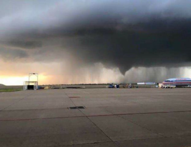 Boeing 737-700 — - Tornado passing north of Tulsa Airport.