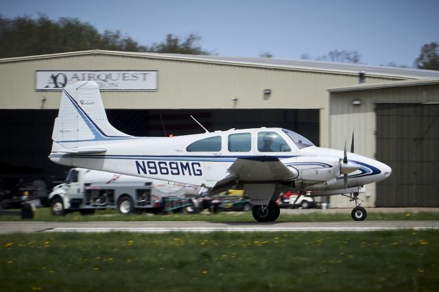 Beechcraft Travel Air (N969MG) - Landing on Runway 8 at KBTP.br /Note how high the throttles are.