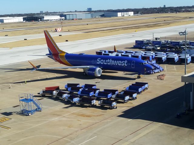 Boeing 737 MAX 8 (N8737L) - 12/26/2020 SWA's first Max 8 out of storage parked at remote ramp B5 at KDAL