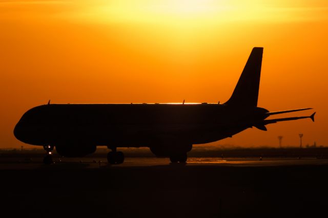 Airbus A321 (A7-ADT) - Qatar shiluette in bright clear sunset at LHBP, Budapest.