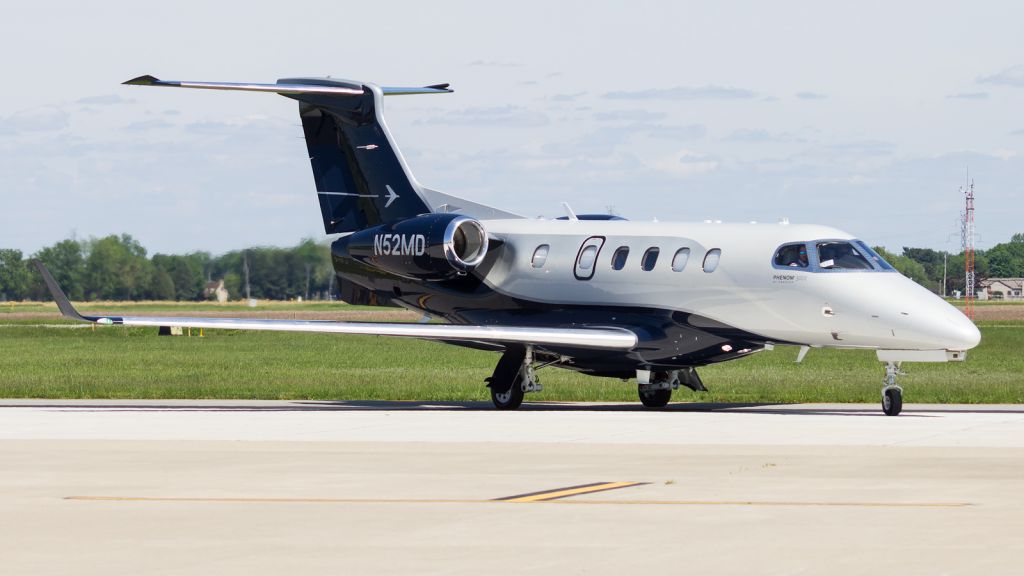 Embraer Phenom 300 (N52MD) - A Phenom 300 for Nicholas Air turns onto the apron at KPPO...5/23/22