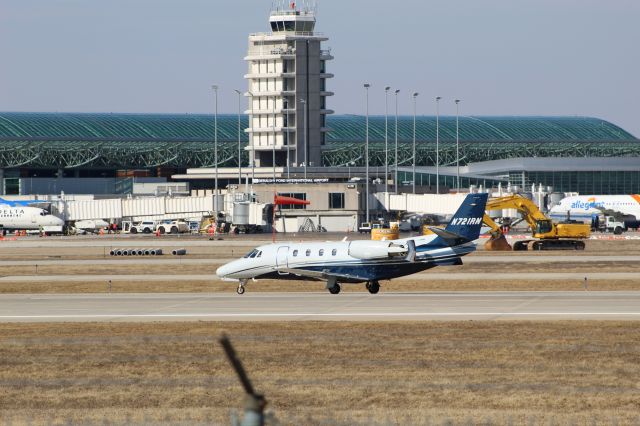 Cessna Citation Excel/XLS (N721RN) - Citation taxing to parking after a couple of touch and goes at Grand Rapids International Airport runway 26L.