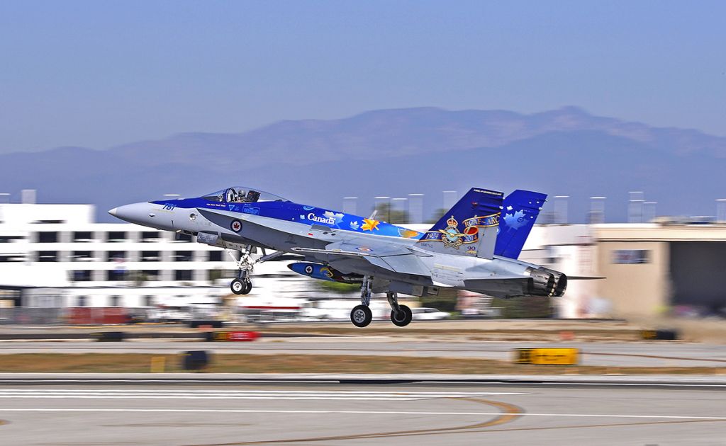 McDonnell Douglas FA-18 Hornet (18-8761) - Canadian F-18 departing Long Beach Airport in California, hes heading back to Canada after performing at Catalina Island Airshow on Saturday.br /br /Photo taken on October 5, 2014.