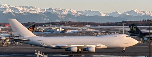 Boeing 747-400 (N445MC) - West perimeter of N-S runway overlooking Atlas cargo tie down area