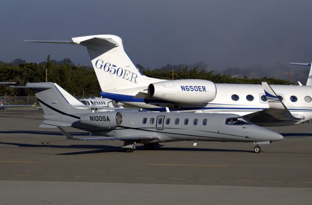 Canadair Challenger 350 (N100SA) - KMRY - Lear 45 easing out past the Gulfstream 650ER at Monterey