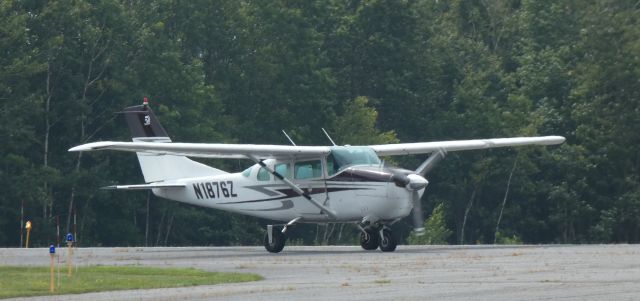 Cessna 205 (N1876Z) - Taxiing to parking is this 1962 Cessna 205 Centurion in the Summer of 2023. 8/5/23