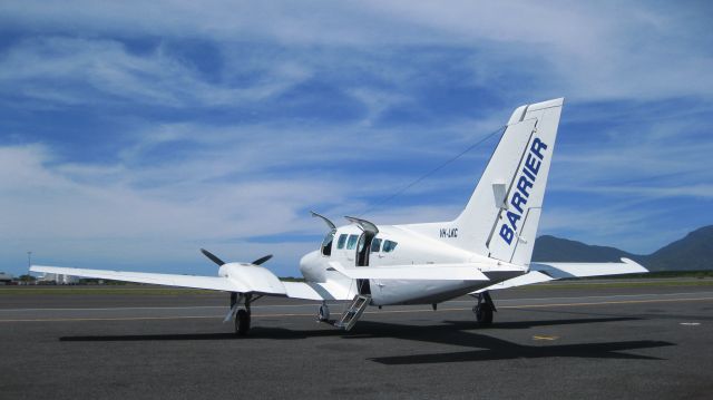 Cessna 402 (VH-LKC) - Barrier Aviation - Aircraft Charterbr /Cairns International Airport, Queensland