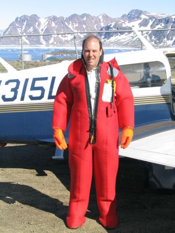 Mooney M-20 (N315L) - Immersion suit on, Mike Knobler prepares to head from Greenland to Iceland in July 2003.