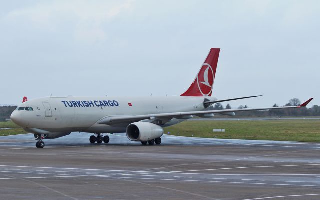 Airbus A330-300 (TC-JDP) - turkish cargo a330-200f tc-jdp taxiing onto stand at shannon 29/11/15.