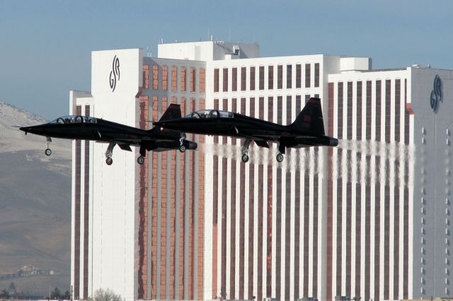 Northrop T-38 Talon (64-0297) - Two Northrop T-38 Black Talons of the 9th Reconnaissance Wing, Beale AFB, Ca., make a formation approach to Reno Tahoe International.