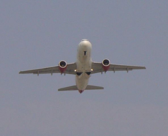 Airbus A319 — - Gear Up! VRD1877 departs runway 27, 7/4/08