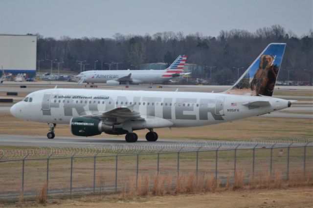 Airbus A319 (N951FR) - Waiting to cross 36C - 12/31/17