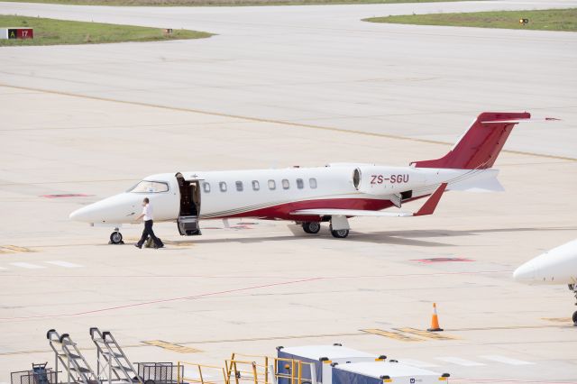 Learjet 45 (ZS-SGU) - Neat example of a LearJet 45 parked on the ramp at FAPE on Tuesday, 4 Sept 2018, prepping for departure on RWY 26. This LJ45 (Serial #365) was built in 2008, and had a paint job to these new colours about a year back.