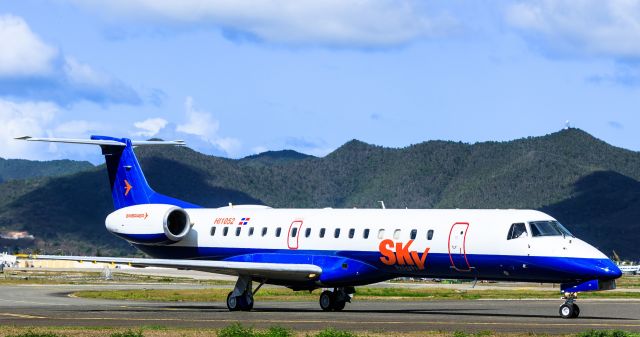 Embraer ERJ-145 (HI1052) - SkyHigh airlines taxing for take off from St Maarten to Santo Domingo.