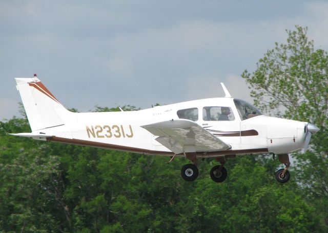 Beechcraft Sundowner (N2331J) - Landing on 14 at Downtown Shreveport.