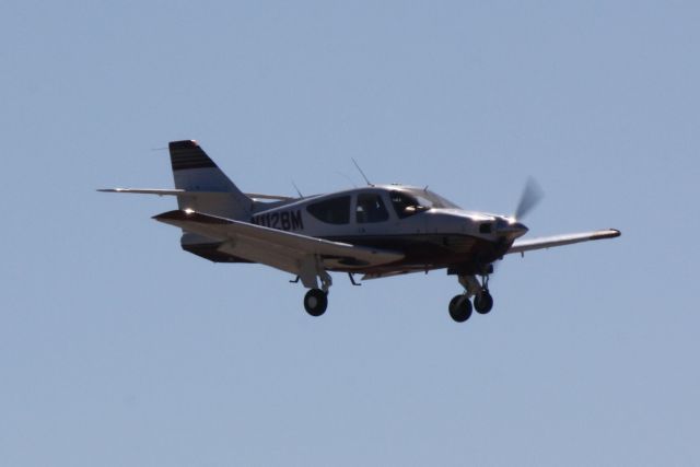 Rockwell Commander 114 (N112BM) - Rockwell Commander 114 (N112BM) arrives at Sarasota-Bradenton International Airport