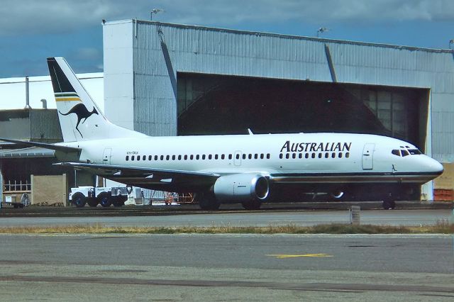 BOEING 737-300 (VH-TAX) - AUSTRALIAN AIRLINES - BOEING 737-376 - REG : VH-TAX (CN 23489/1356) - ADELAIDE INTERNATIONAL AIRPORT SA. AUSTRALIA - YPAD 10/5/1987 35MM SLIDE CONVERSION USING A LIGHTBOX AND A NIKON L810 DIGITAL CAMERA IN THE MACRO MODE.